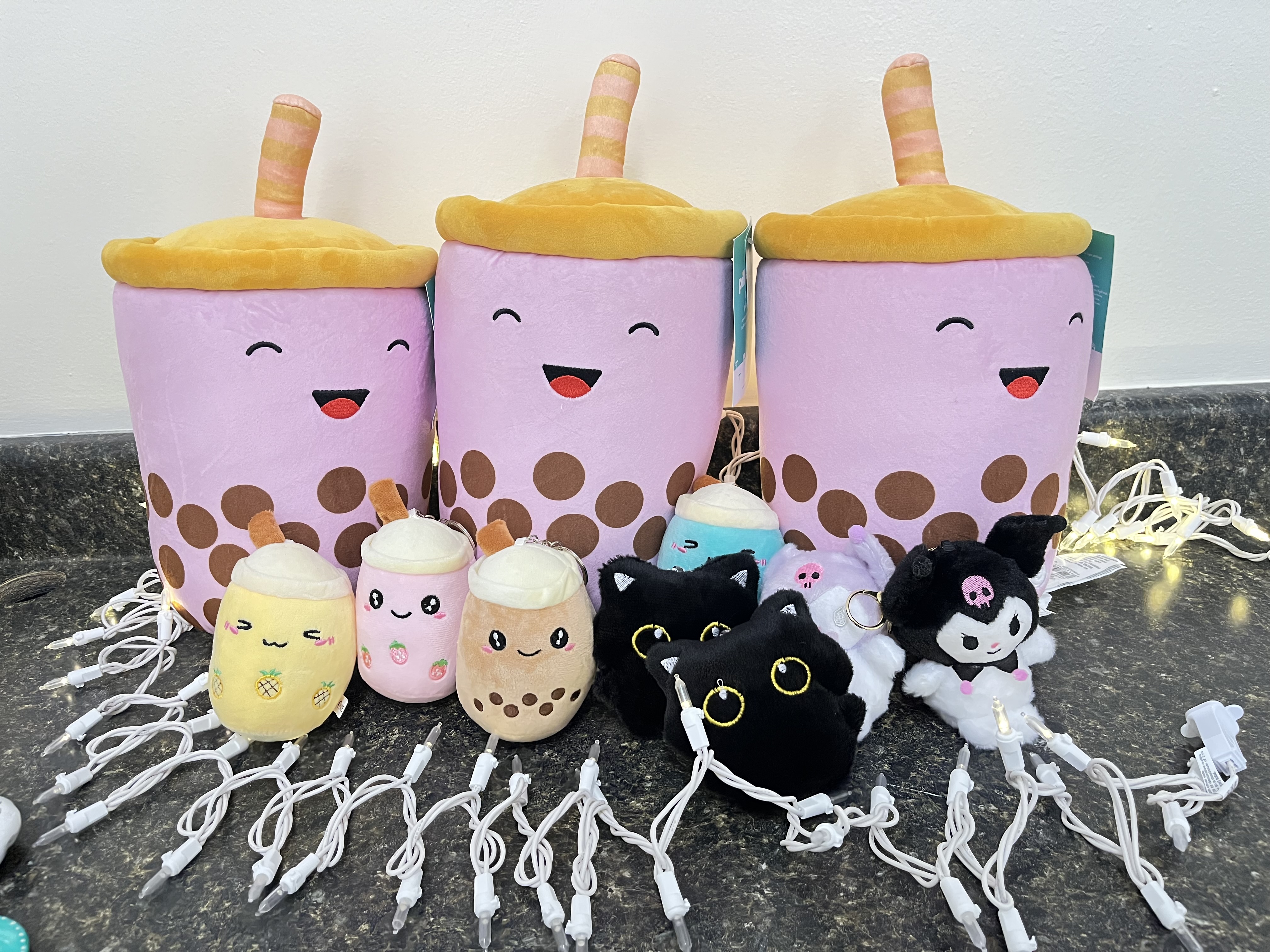 Boba and cat plushies in the shop